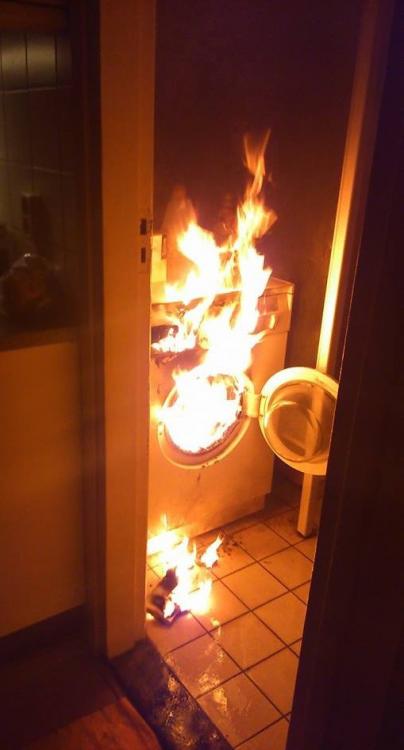 crazy-washing-machine-on-fire-burning-kitchen-1413849867A.jpg